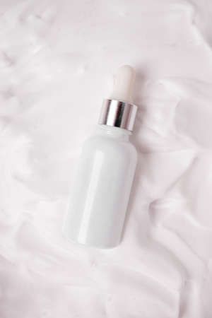 Glass bottle in white foam
