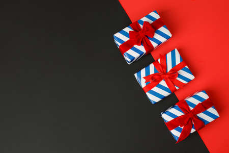 Blue and white stripe gift boxes with red bows