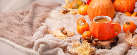 Cup of Pumpkin Spice Latte with Seasonal Autumn Spices, Gingerbread man Cookies and Fall Decor from...
