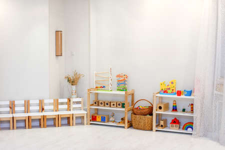 Montessori material, Kindergarten Preschool Classroom Interior, wooden furniture and toys, didactic materialsの写真素材