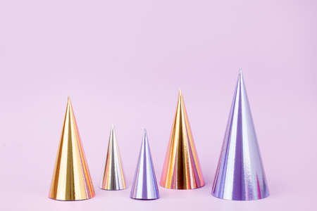 Futuristic modern abstract happy New Year 2022, Merry Chrstmas concept. Pine tree from hologram paper on pastel violet background, copy space, banner for your site, invitation, flyerの写真素材