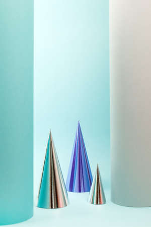 Futuristic modern abstract happy New Year 2022, Merry Chrstmas concept. Pine tree from hologram paper on pastel background, copy space, banner for your site, invitation, flyerの写真素材