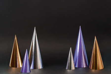 Futuristic modern abstract happy New Year 2022, Merry Christmas concept. Pine tree from hologram paper on black background, copy space, banner for your site, invitation, flyerの写真素材