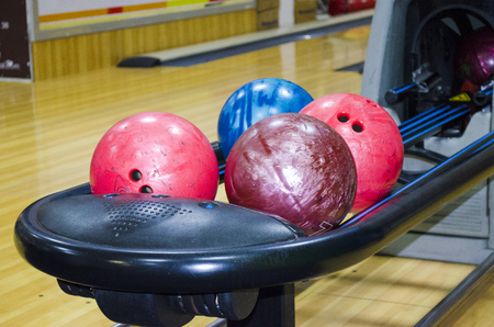 colorful and different balls for bowling in the roomの写真素材