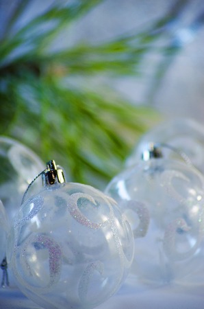 White Christmas balls on the Christmas tree closeupの写真素材