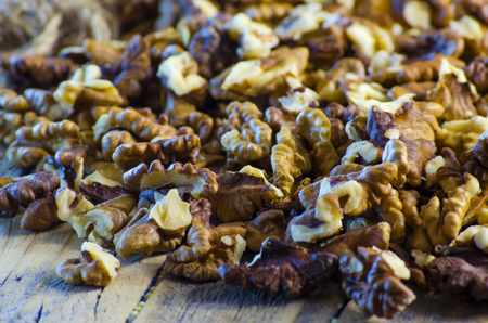 raw walnuts shelled on a table close-up