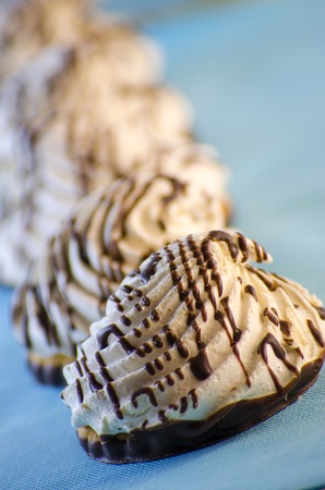 cookies with a cream tea on a blue backgroundの写真素材