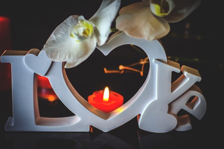 postcard to the day of all lovers or Valentine's Day in the form of the word loveの写真素材