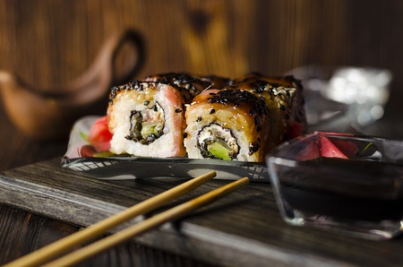 sushi rolls with red fish in sweet sauceの写真素材
