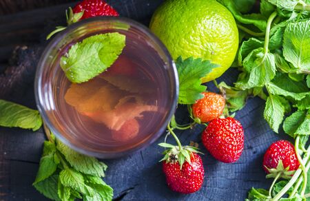 strawberry compote with mint and lime, refreshing drink homemade strawberry mahitoの写真素材