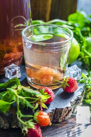 strawberry compote with mint and lime, refreshing drink homemade strawberry mahitoの写真素材