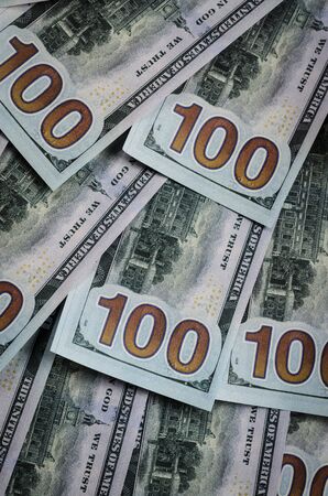 One hundred dollar bills as a background