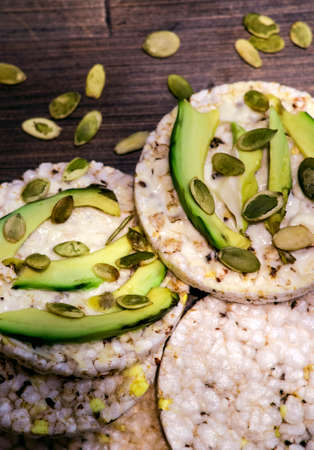 Dry bread sandwich with avocado and pumpkin seeds