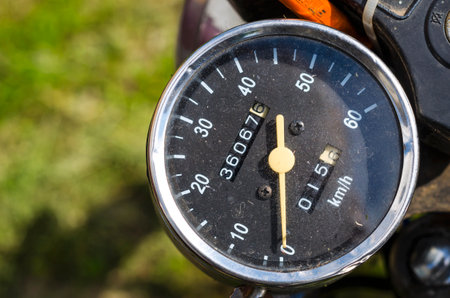 Motorcycle dashboard, speedometer, black dial shows the speed of the motorcycle.の写真素材