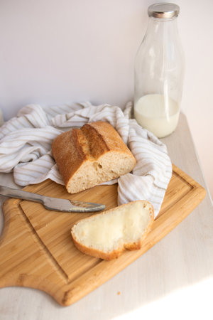 Fresh bread for breakfast on tableの写真素材