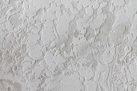 Gray-white background. The texture of decorative plaster.の写真素材