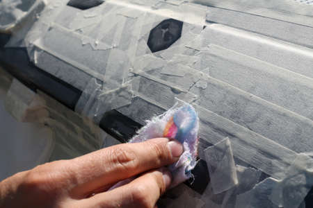 Body repair of the car with their own hands. Preparation for painting.の写真素材