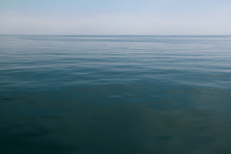 A smooth surface of the largest lake of Turkey - Lake Van in the Eastern Anatolia regionの写真素材