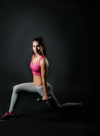 a girl in sport does a fitness a clothingの写真素材