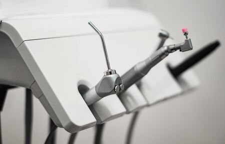 dentist tools on a stand in a roomの写真素材