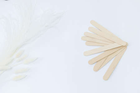 putty knife for shugaring on a white background. beauty perfumeの写真素材