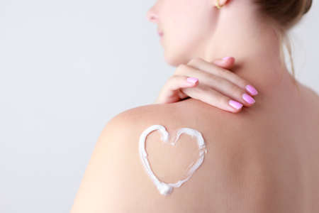 Close up view of young woman making stop gesture with her hand.の写真素材