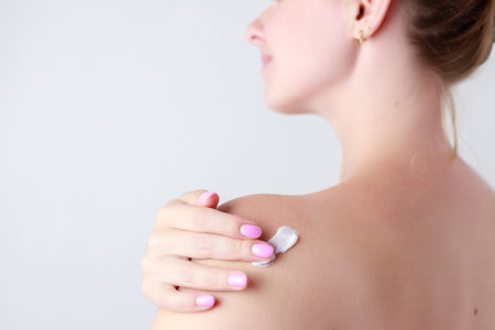 The woman has a severe stomachache. acute pain in the abdomenの写真素材