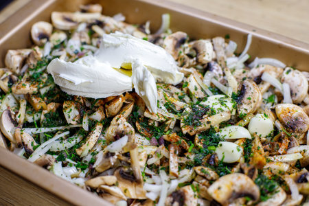 chopped mushrooms, onions, spices and cream cheese ready for baking