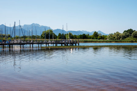 lake with boats in bavariaの写真素材