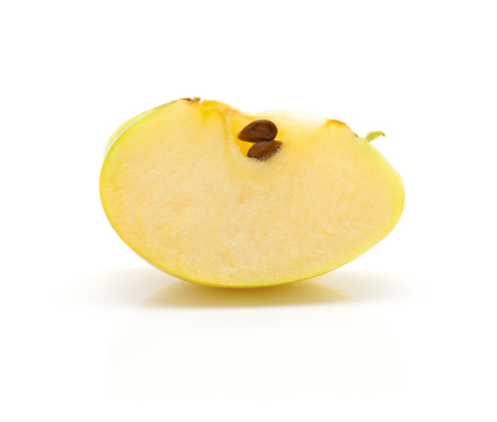 Apple (Smeralda variety) slice with seeds isolated on white background
の写真素材