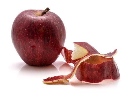 One whole Gala apple with separated rind isolated on white background