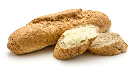 Wheat bran bread snack with butter and salt isolated on white background one whole and two pieces
の写真素材