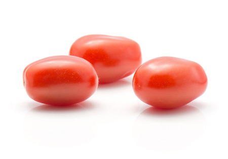Three cherry tomatoes isolated on white background
の写真素材