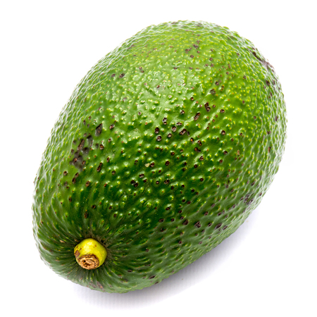 One whole avocado (Persea americana, alligator pear) isolated on white background
の写真素材