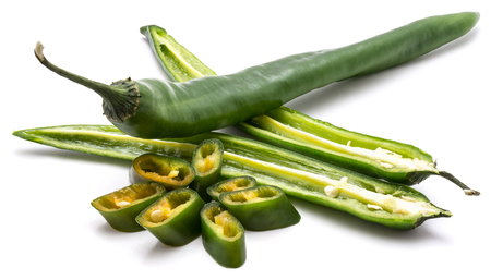 One whole green Chili pepper, two halves and slices isolated on white background
の写真素材