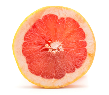 One red grapefruit ring slice isolated on white backgroundの写真素材