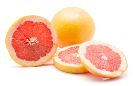 Sliced red grapefruit isolated on white background one whole three ring slices
の写真素材