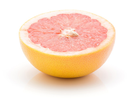 Red grapefruit half isolated on white background one cross section
の写真素材