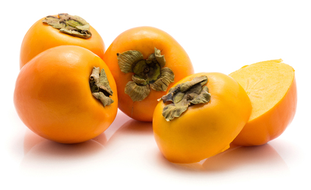 Persimmon Kaki isolated on white background three whole two sliced halves
の写真素材