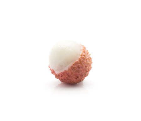 One peel lychee isolated on white background ripe pink fresh berry
の写真素材