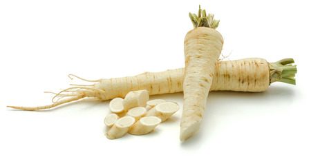 Two parsley root and chopped pieces isolated on white background
の写真素材