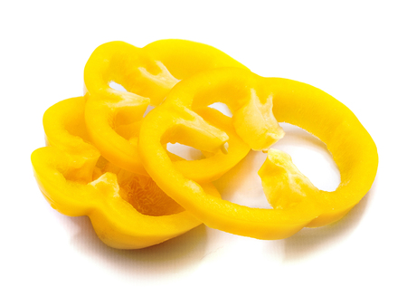 Yellow sliced pieces of pepper isolated on white background
の写真素材