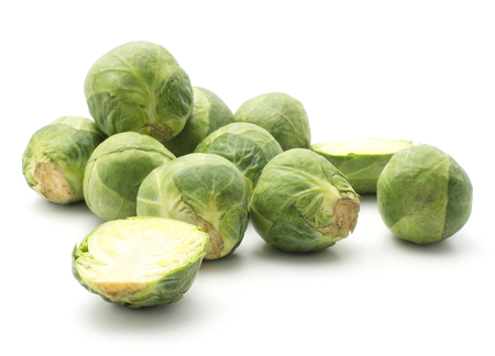 Raw Brussels sprout stack isolated on white background heads two sliced halvesの素材 [FY31092908045]