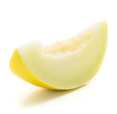 One yellow honeydew melon slice isolated on white background without seeds
の写真素材