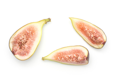 Cut figs top view isolated on white background one half two slices ripe purple green rose flesh
の写真素材