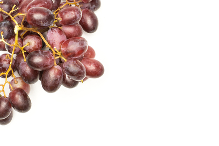 Red globe grape cluster top view isolated on white background dark pink berriesの写真素材