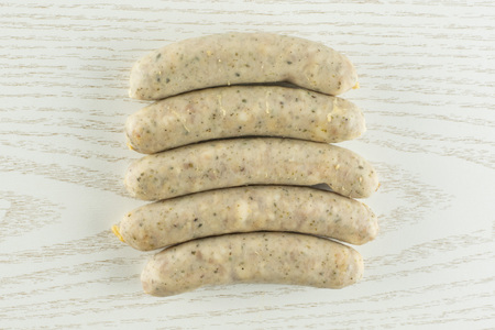 Group of five whole bavarian white sausage flatlay on grey woodの写真素材