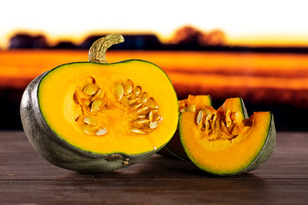 Group of one half two slices of fresh blue grey pumpkinの写真素材