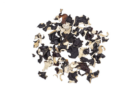 Lot of slices of dry black mushroom jew ear variety heap flatlay isolated on white backgroundの写真素材