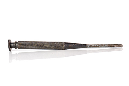 One whole rusty metal turnscrew work item isolated on white background